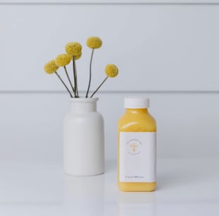 Juice bottle and flowers